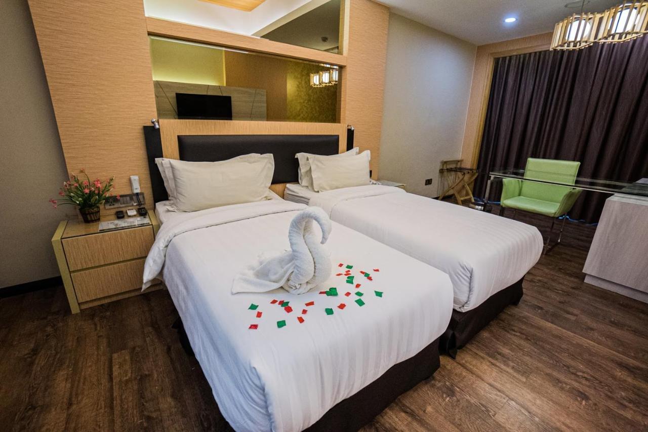 Jc Mark Hotel Бинтулу Екстериор снимка