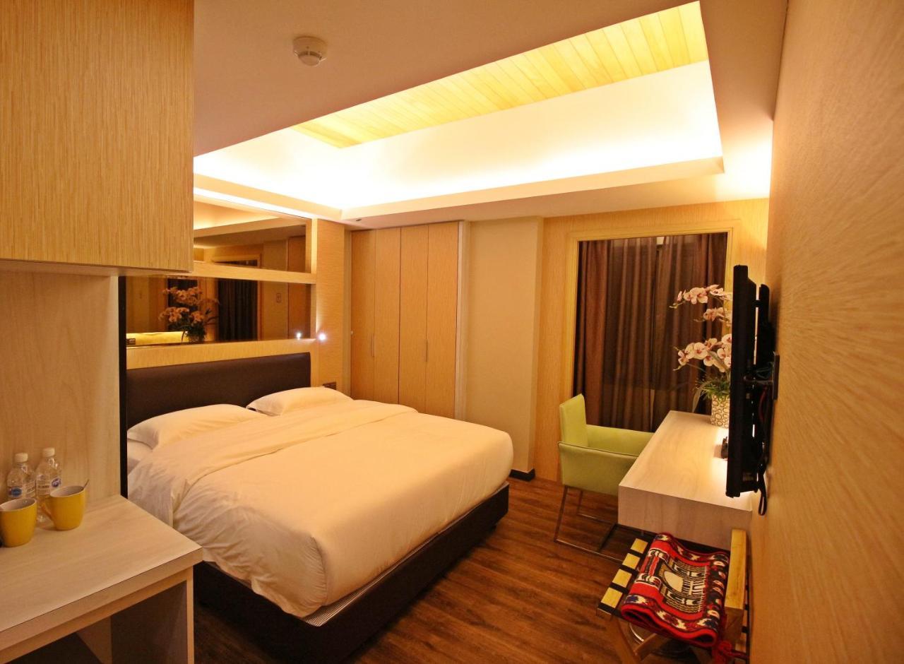 Jc Mark Hotel Бинтулу Екстериор снимка